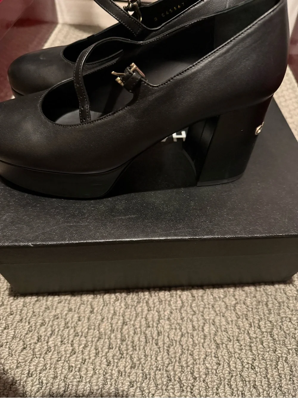 CHANEL Black Platform Mary Jane Pumps with Gold Accent